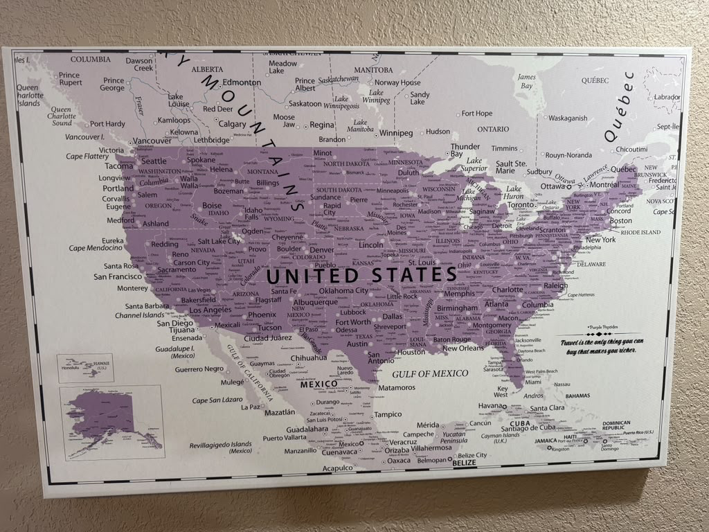 Framed purple pin map of the United States marking Purple Peptides customer cities